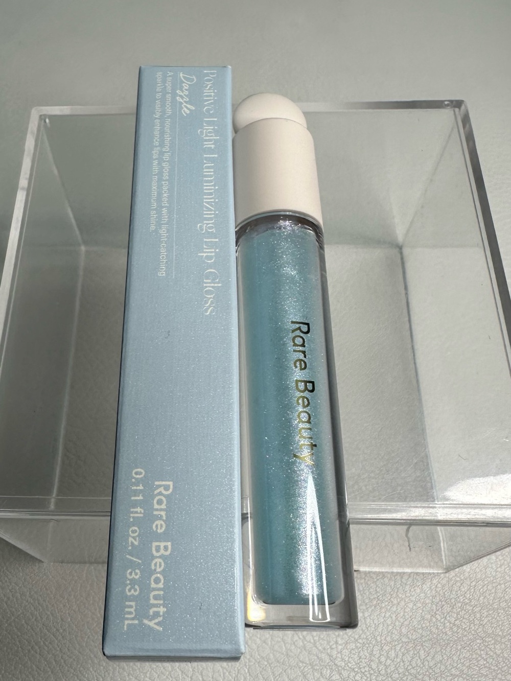 Rare Beauty Positive Light Luminizing Lip Gloss — Shimmering Blue